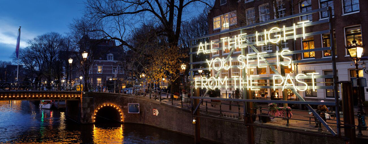 All the light you see illuminated neon installation by Alicia Eggert along the Amsterdam canal route