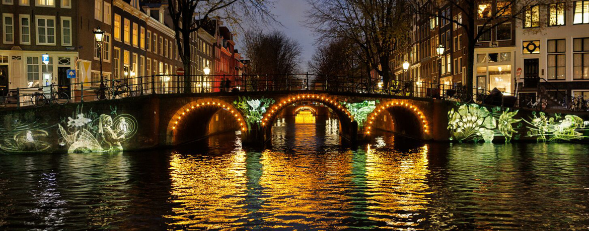 Metamorfaunes luminous mythical animal light sculptures along canal quays by Luminariste