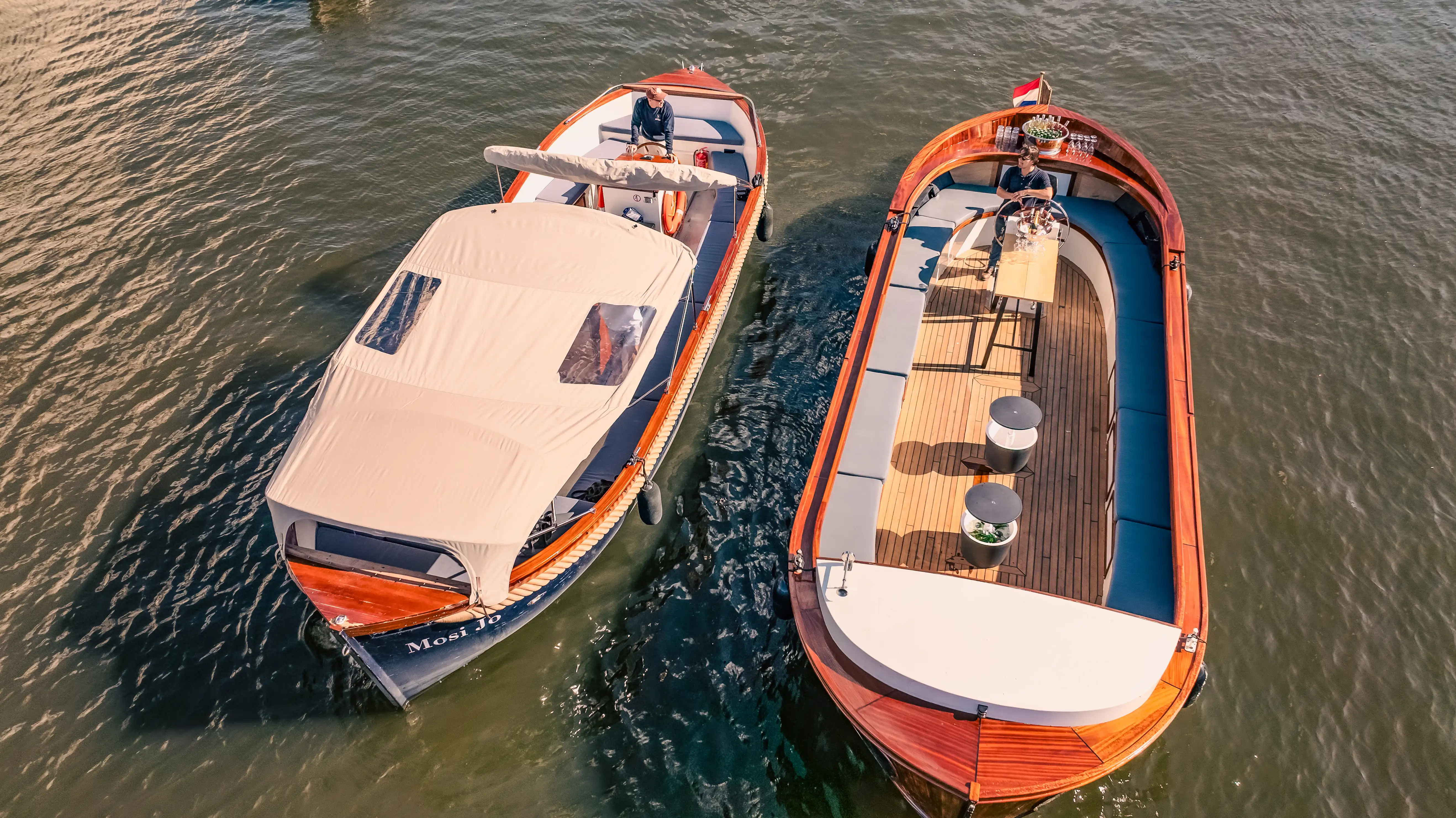 Private electric canal boat for group outings in Amsterdam
